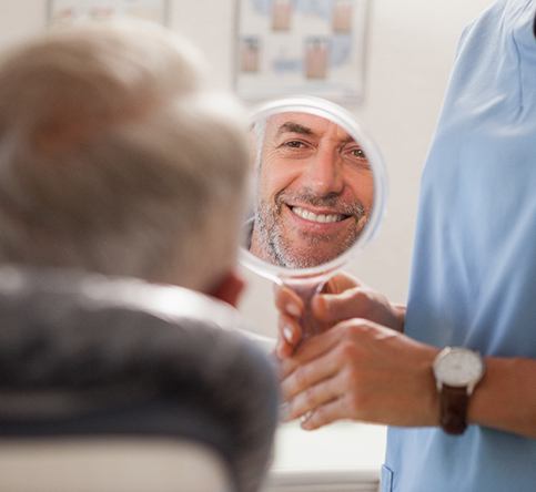 A dentist performing cosmetic dental bonding 