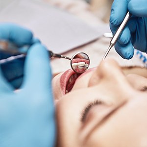 A woman undergoing a dental checkup 