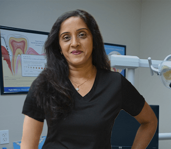 Trusted Westchase Florida dentist Mamata Ponnaganti D M D smiling in dental office