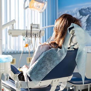 Woman relaxing in dental treatment chair